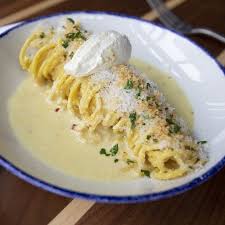 Pepp & Dolores signature dishes  Limone Pasta, Bolognese, Ricotta + Honey, various fresh pasta selections, Crispy Calamari.